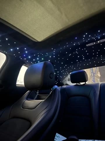 White and blue starlight headliner installation