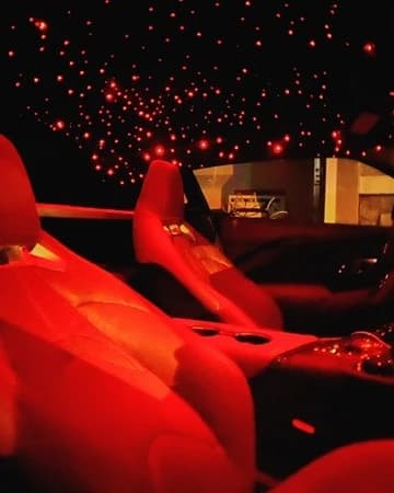 Red starlight headliner in a sport car interior