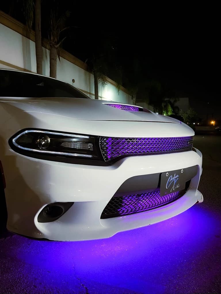 White Dodge Charger with purple custom lighting